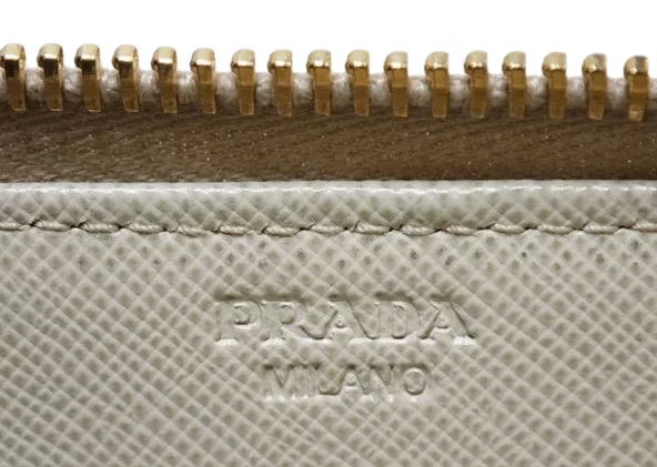 Prada Wallets Prada Saffiano Leather Zippy White Wallet