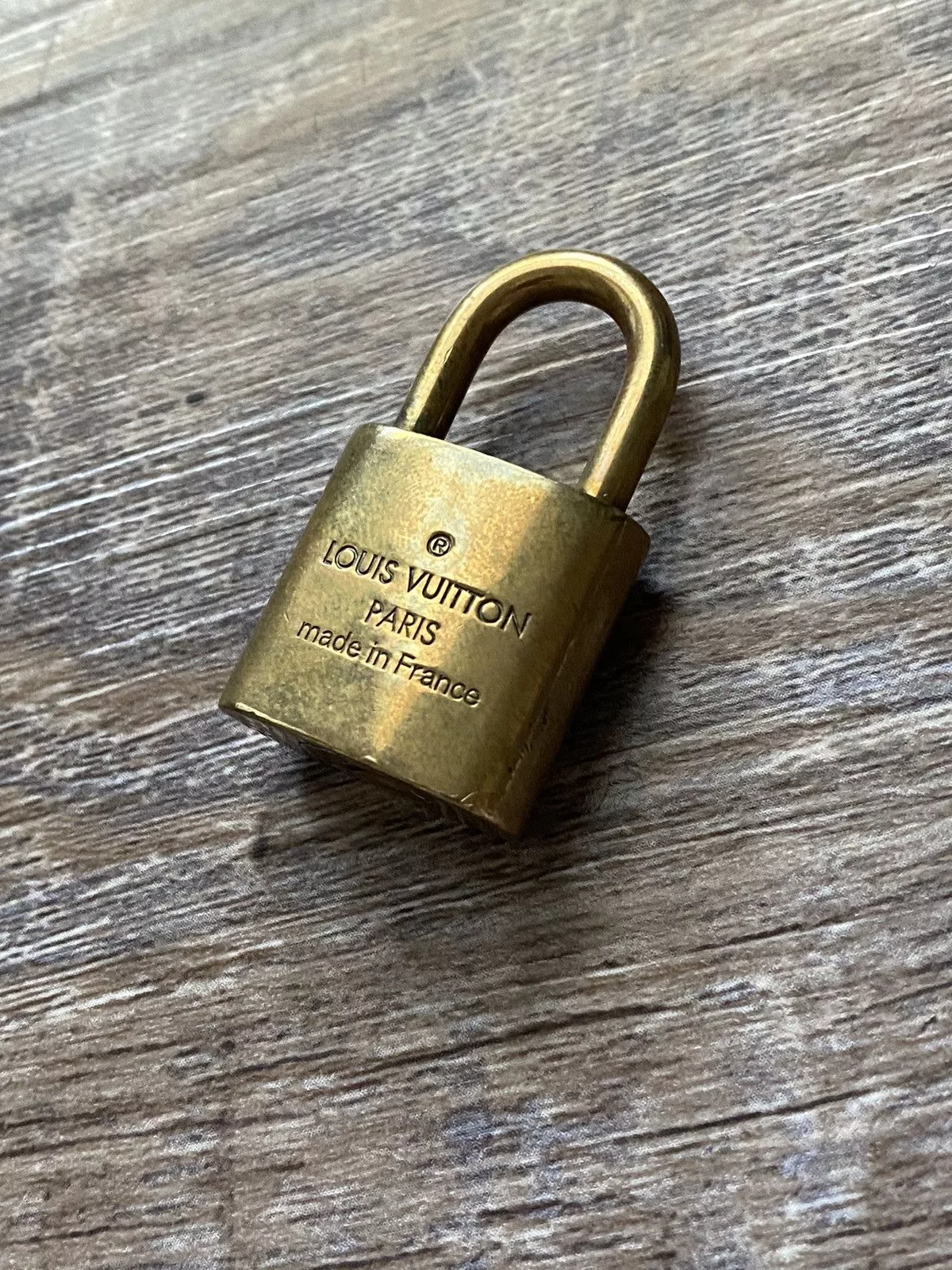 Louis Vuitton Miscellaneous Louis Vuitton Lock 332 Gold