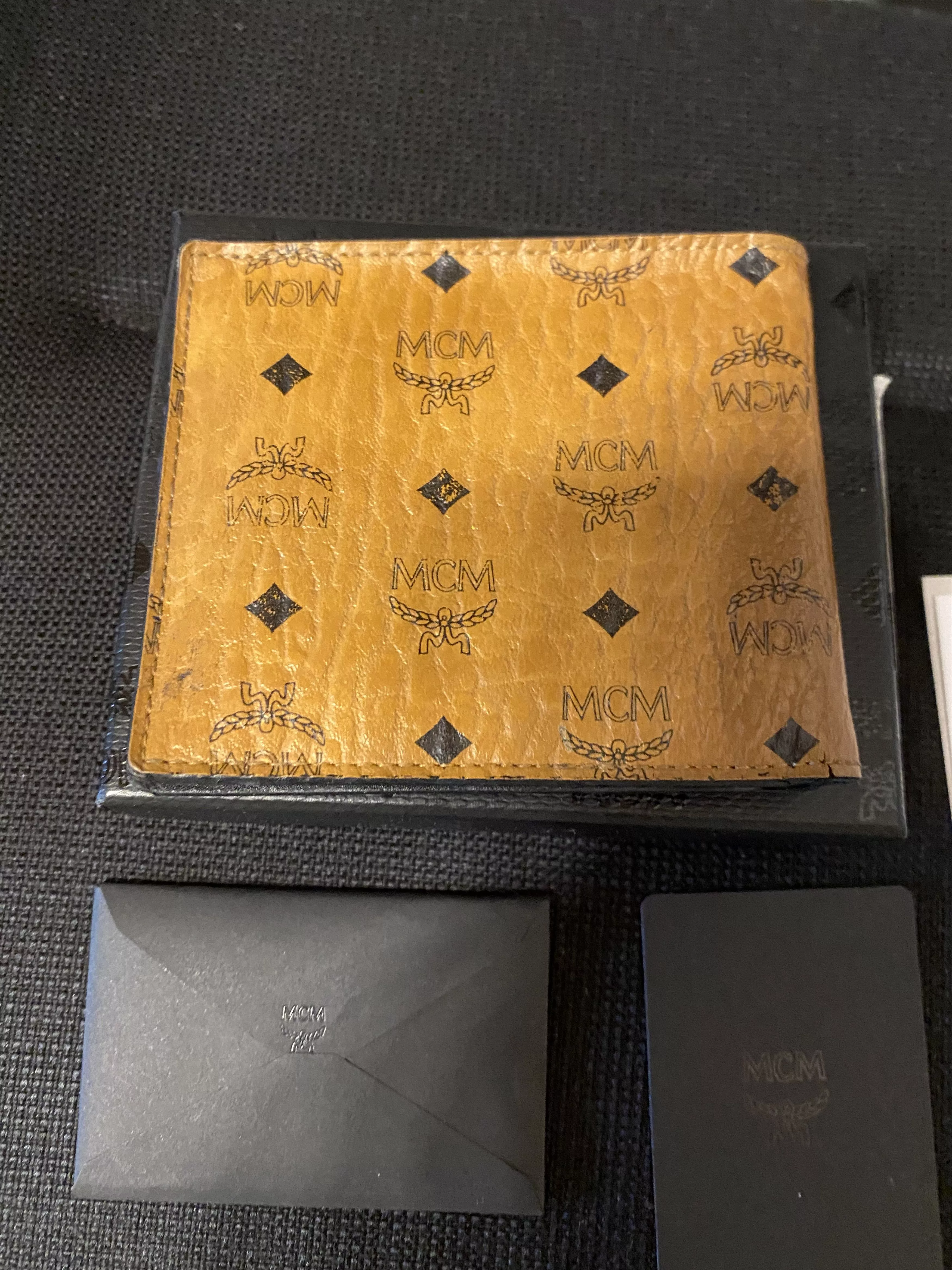 MCM Wallets MCM Wallet Cognac Distressed Victory patch logo print Brown