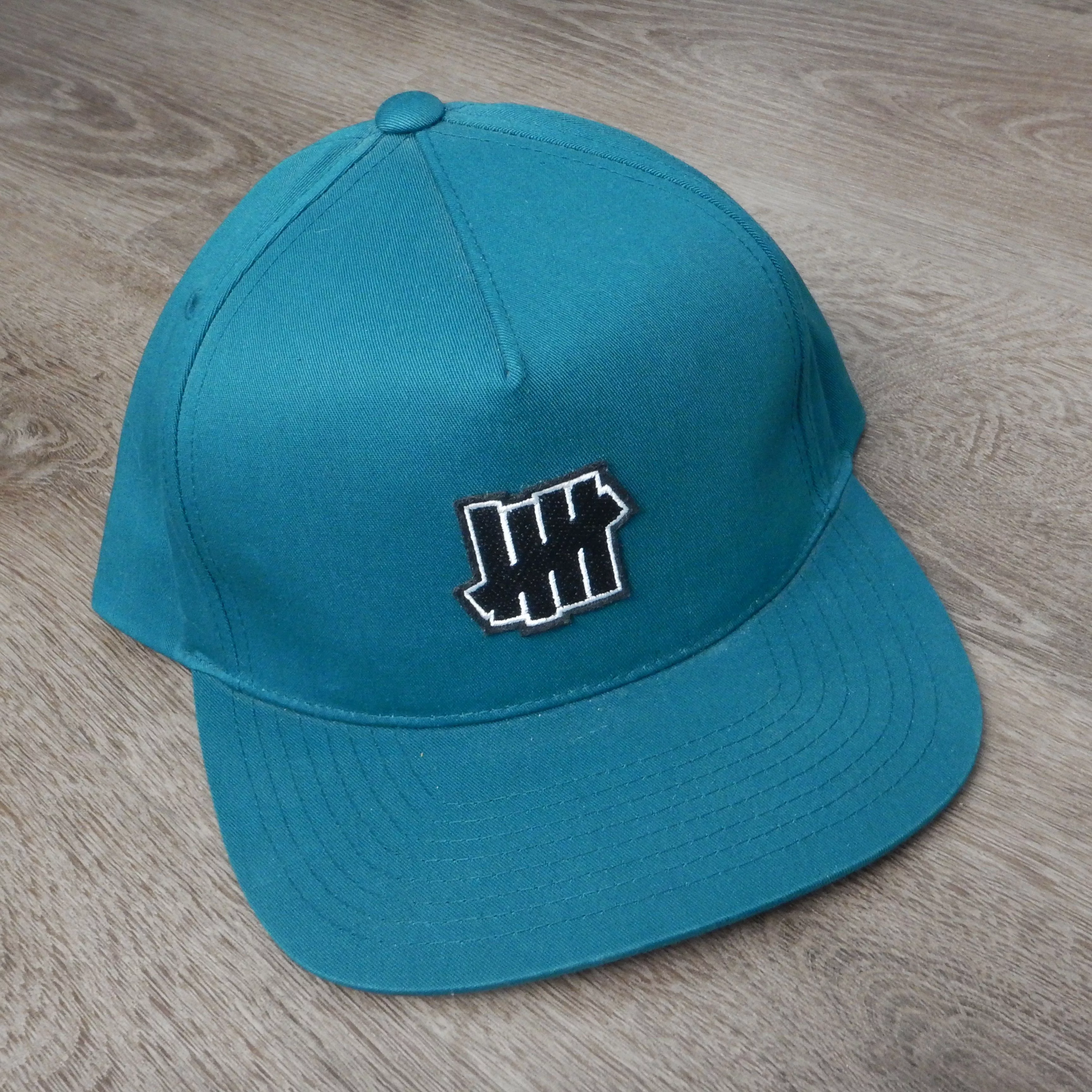 Undefeated Hats SAMPLE Undefeated Turquoise Five Strikes Logo Snapback Blue