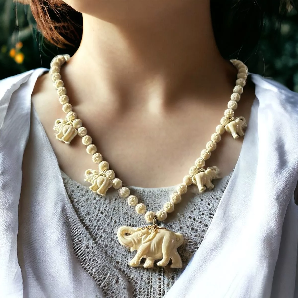Vintage Necklaces Vintage beaded elephant necklace Beige