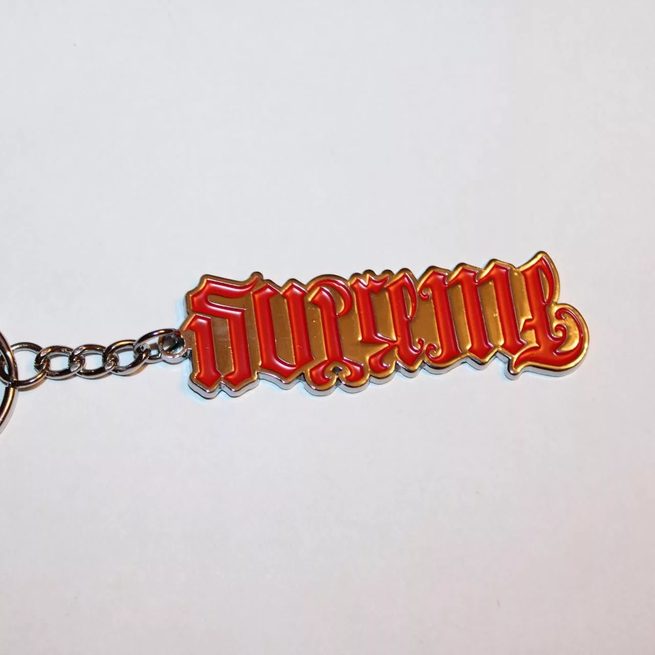 Supreme Supreme Supreme Ambigram Keychain - Red
