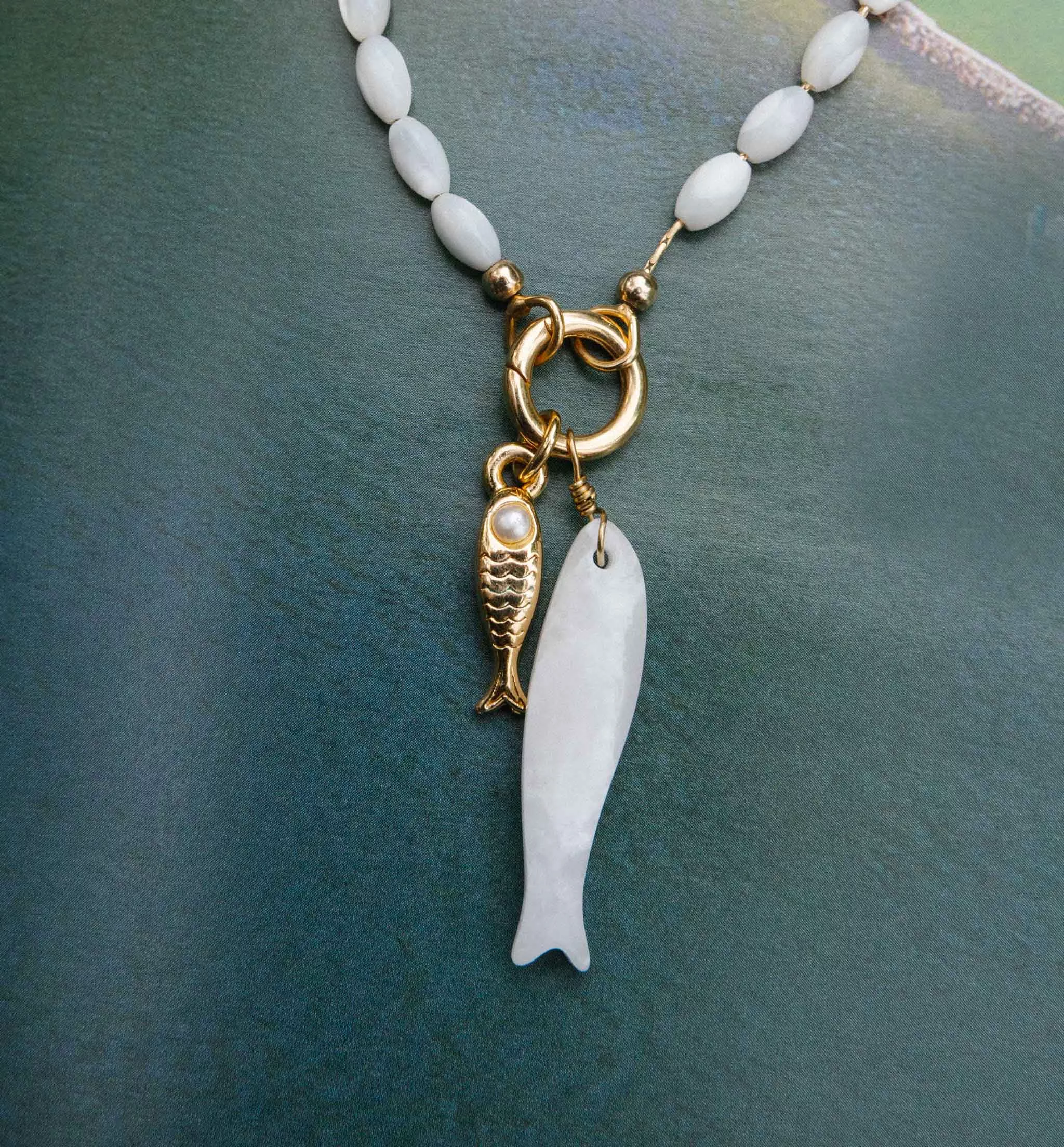The Gemstone Fish Charm