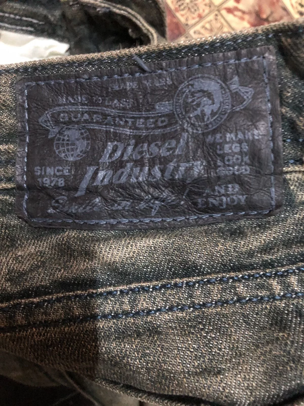 Diesel Denim Diesel Rusty Mudmax Distressed Boot Cut Denim Pants Blue