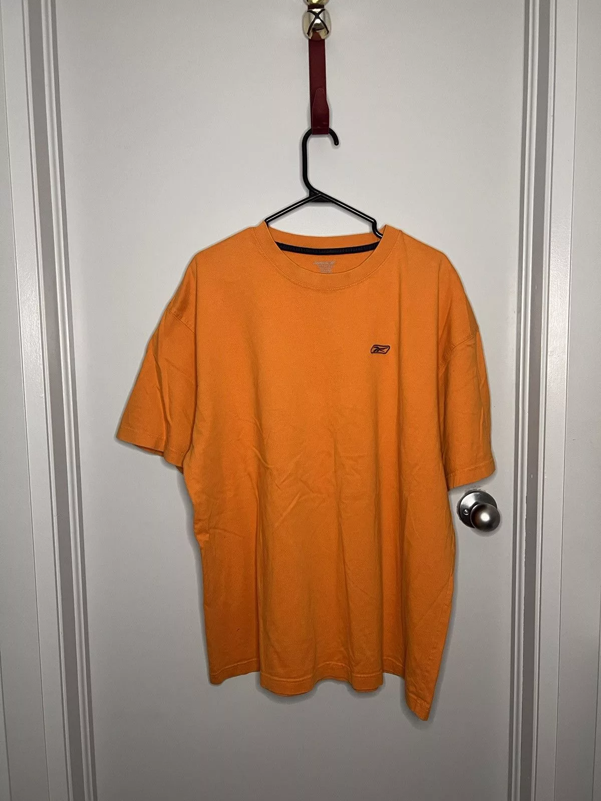 Reebok Short Sleeve T Shirts orange Reebok t-shirt.