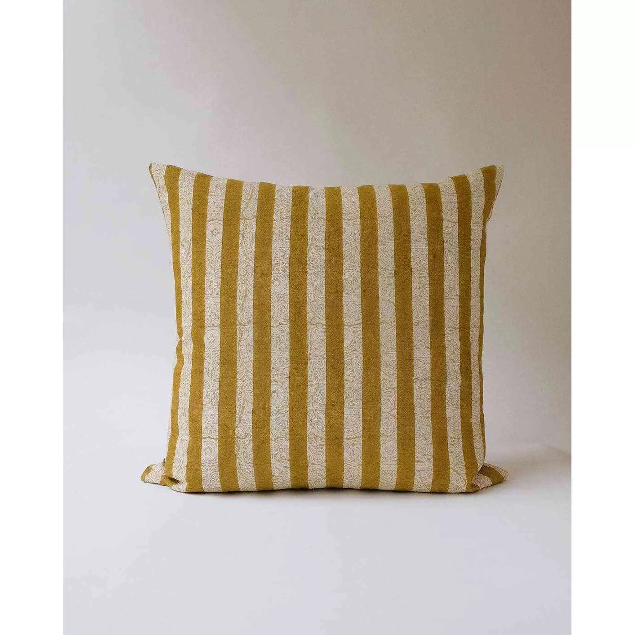 A khaki sage linen pillowcase with a striped hand-block print.