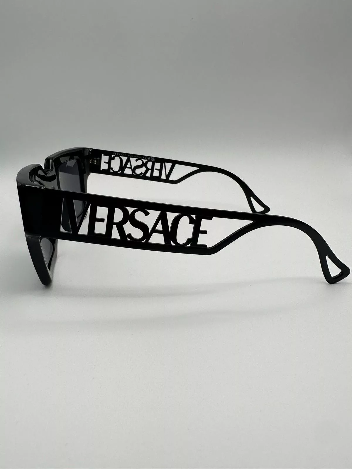 Versace Sunglasses Versace Spell-out Sunglasses Black