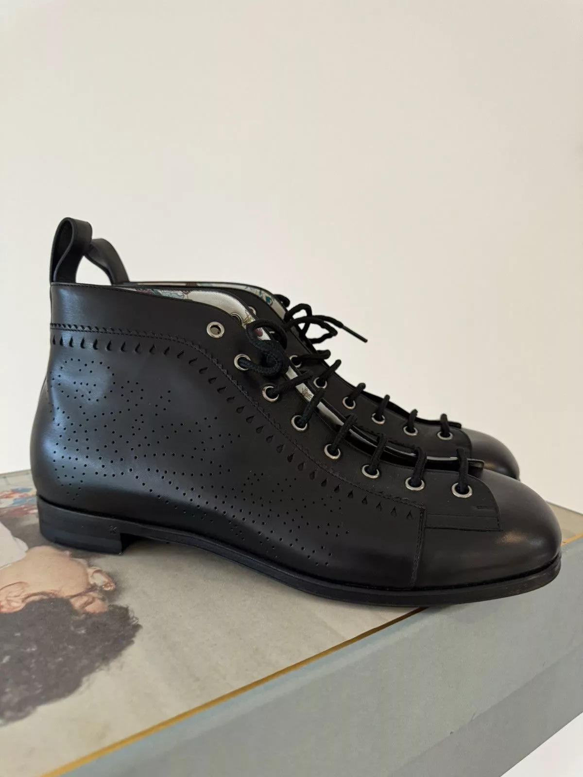 Gucci Boots GUCCI PERFORATED LEATHER JAKARTA BOOTS Black