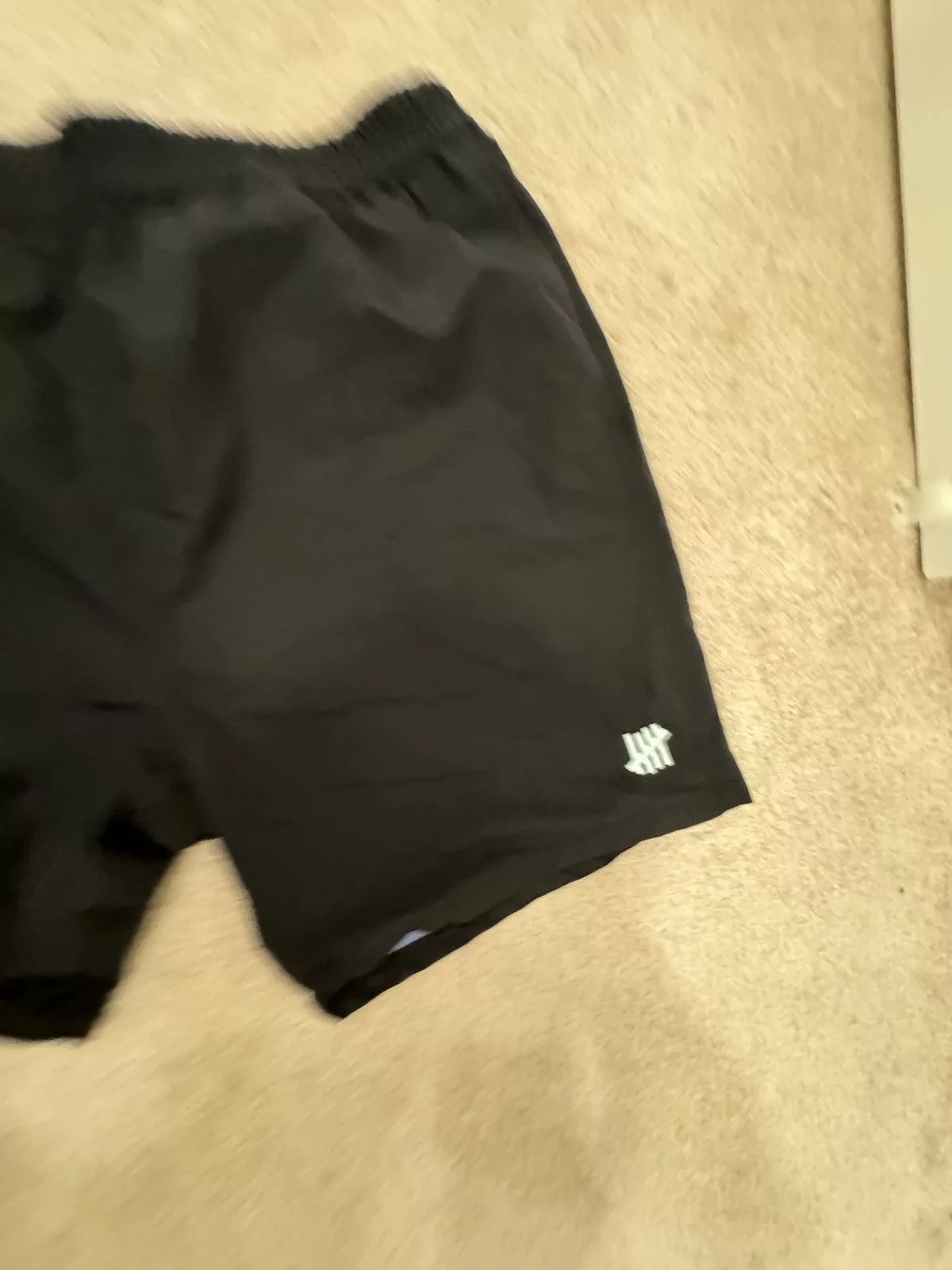 Undefeated Shorts UNDEFEATED Black Nylon Shorts inside bball mesh