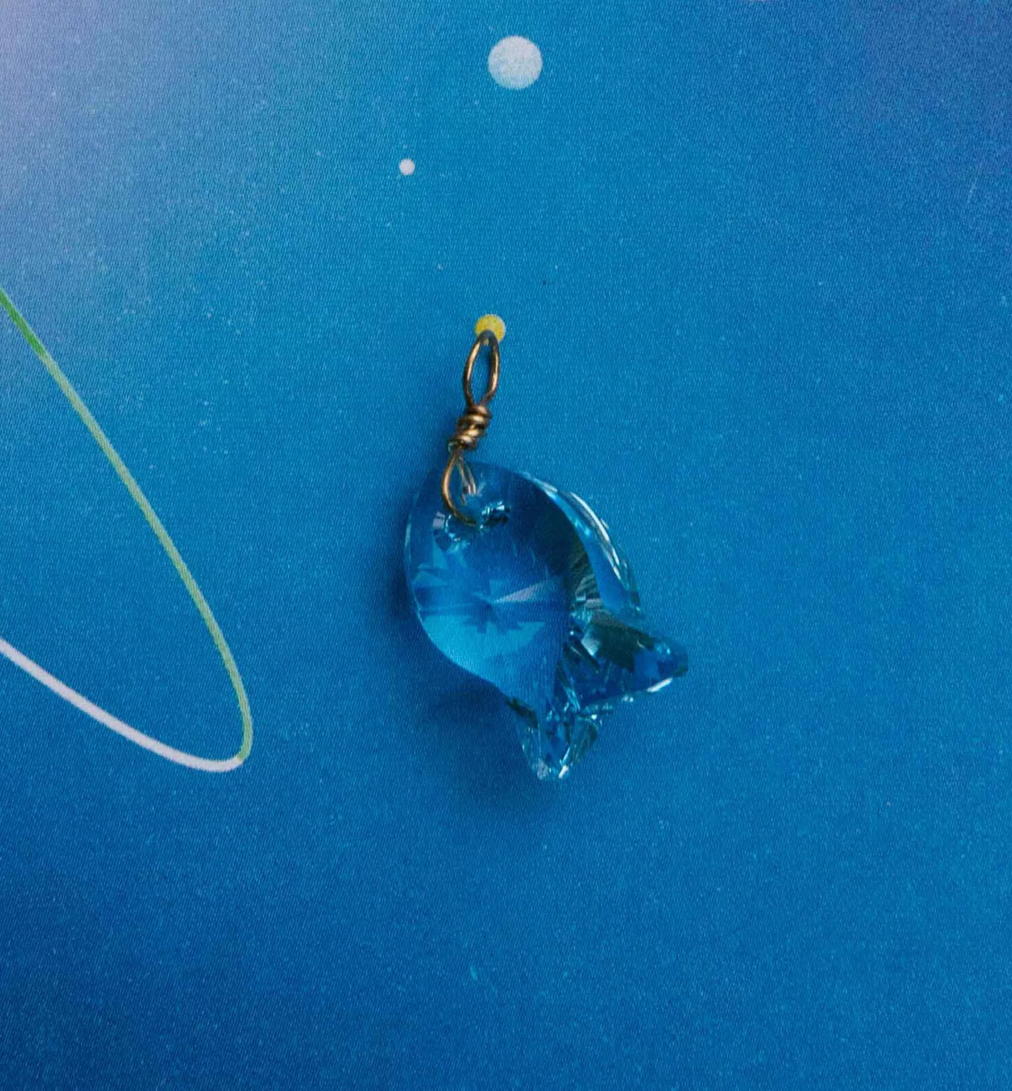 The Crystal Fish Charm