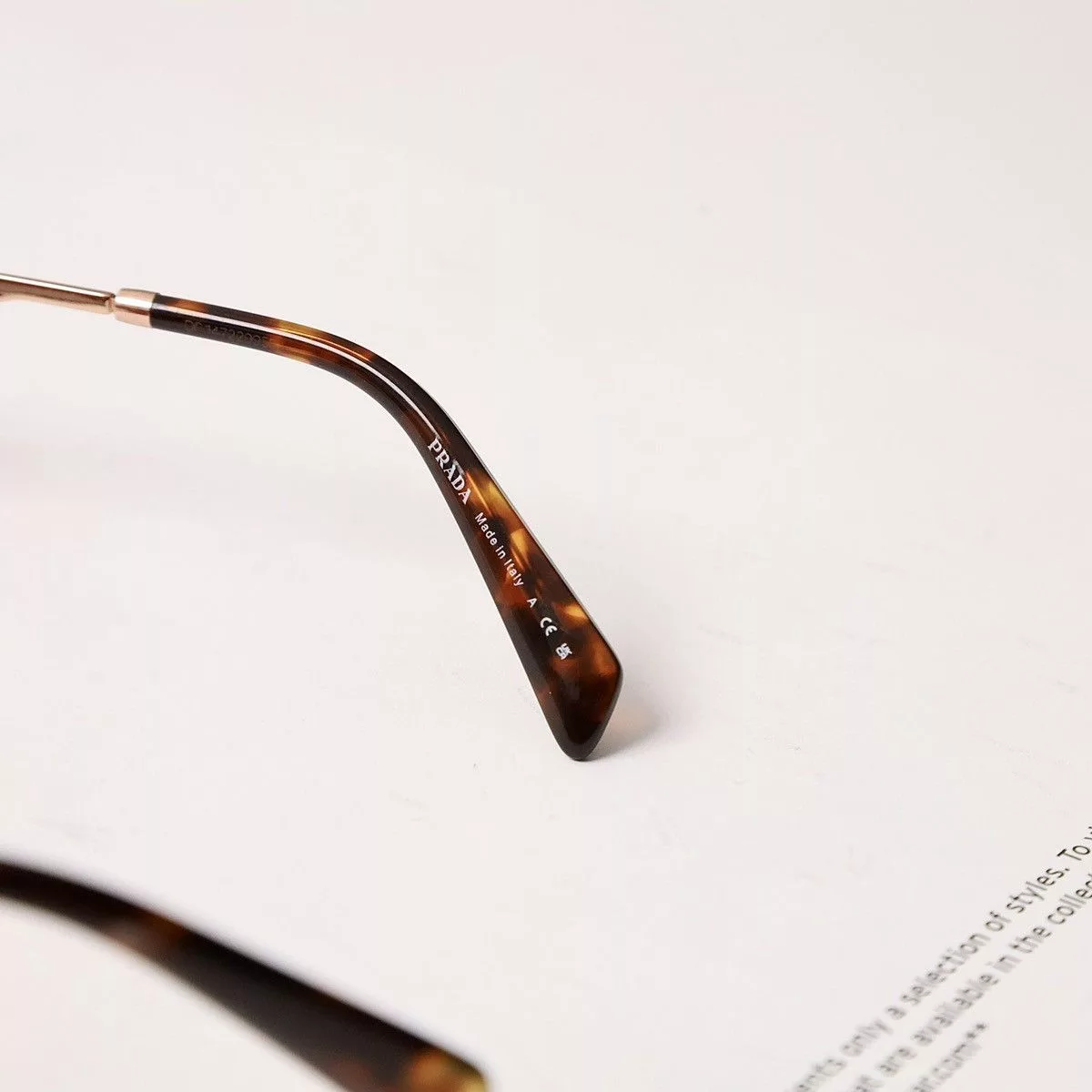 Prada Glasses PRADA 0PR A50V GLASSES Gold