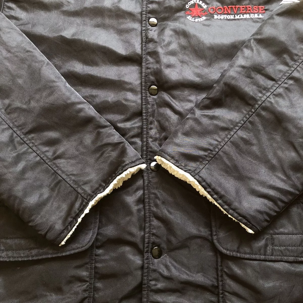 Converse Raincoats CONVERSE spellout embroidered logo raincoat Black