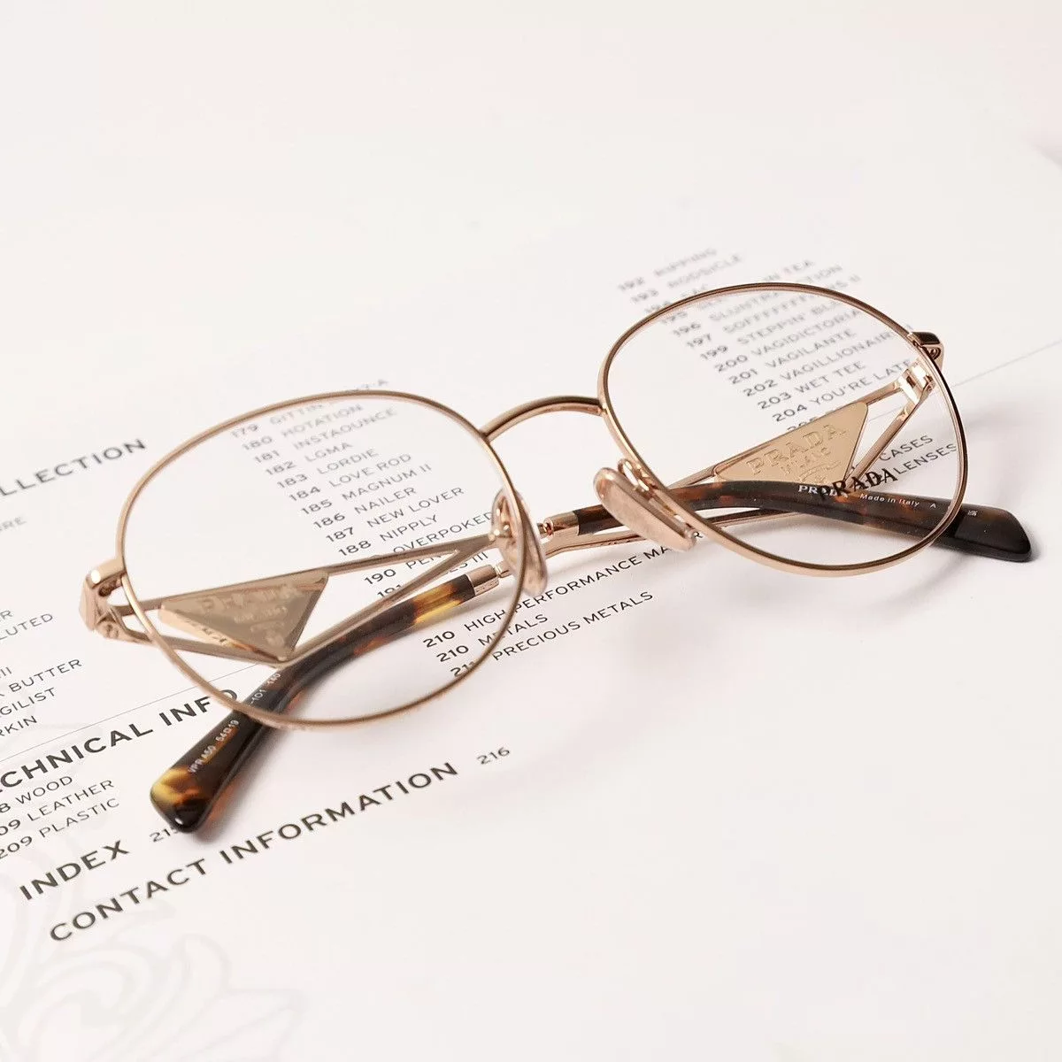 Prada Glasses PRADA 0PR A50V GLASSES Gold