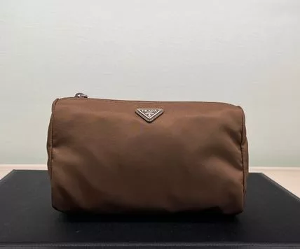 Prada Clutches Prada o1srvl11e0624 Size: OS / Clutches Bag in Brown