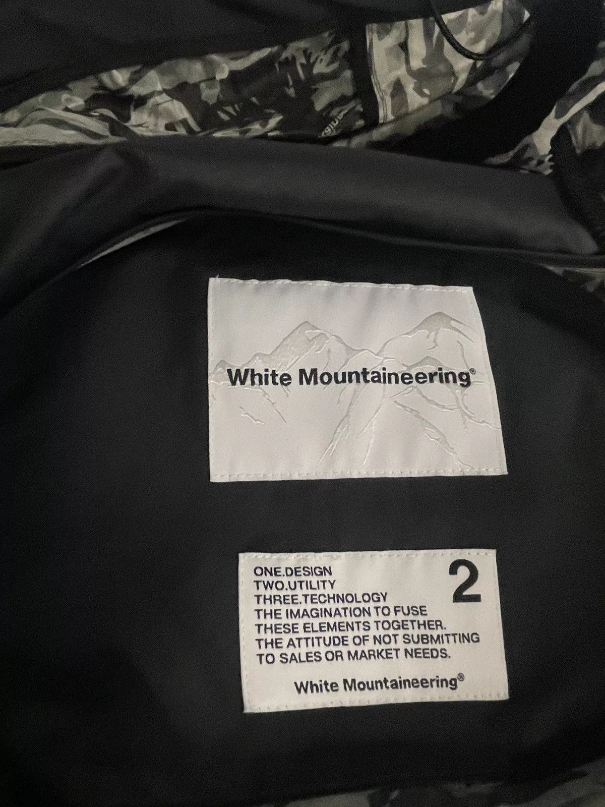 White Mountaineering Light Jackets White Mountaineering BLACK AND WHITE PRINTED ZIP UP HOODIE