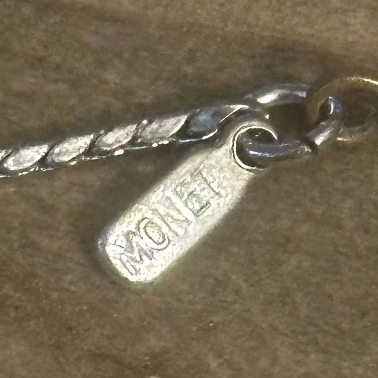 Monet Necklaces Vintage Monet love knot necklace Silver