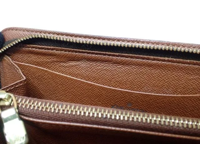 Louis Vuitton Wallets Louis Vuitton Monogram Canvas Vintage Zippy Brown Wallet