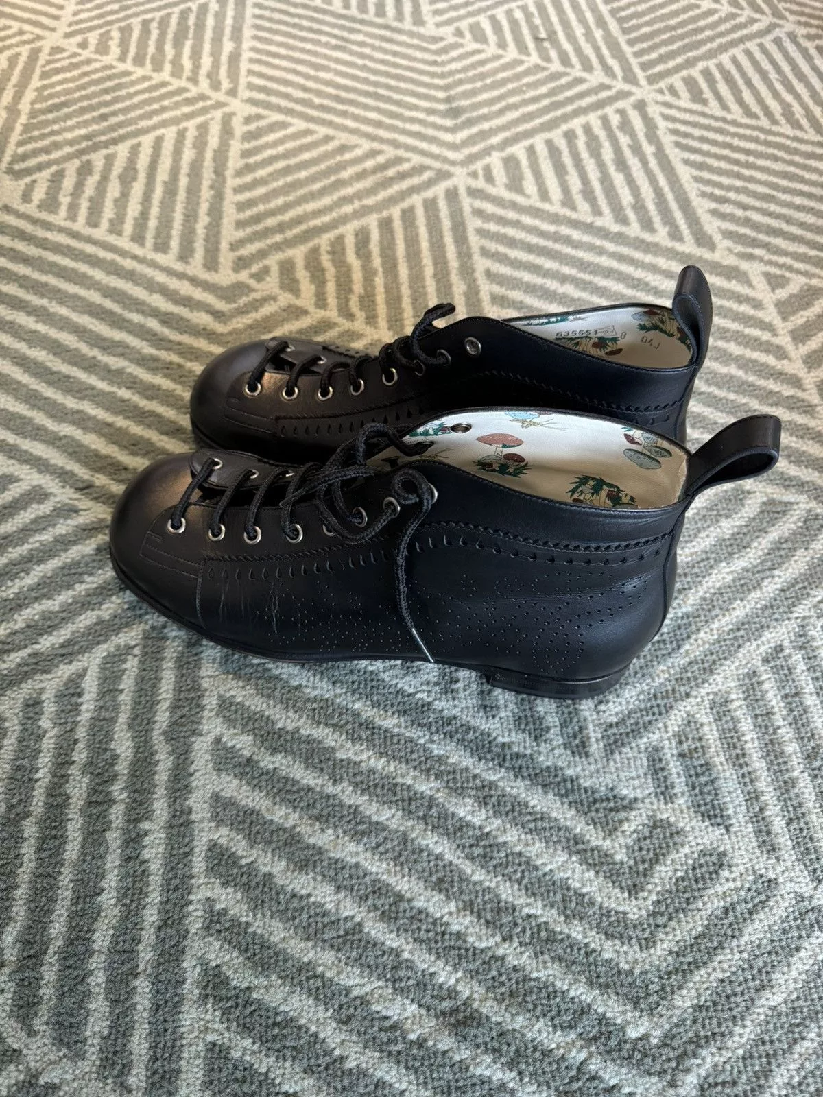 Gucci Boots GUCCI PERFORATED LEATHER JAKARTA BOOTS Black