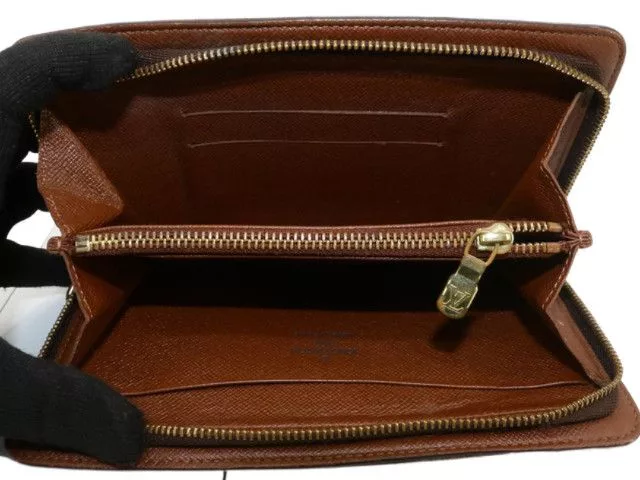 Louis Vuitton Wallets Louis Vuitton Monogram Canvas Vintage Zippy Brown Wallet