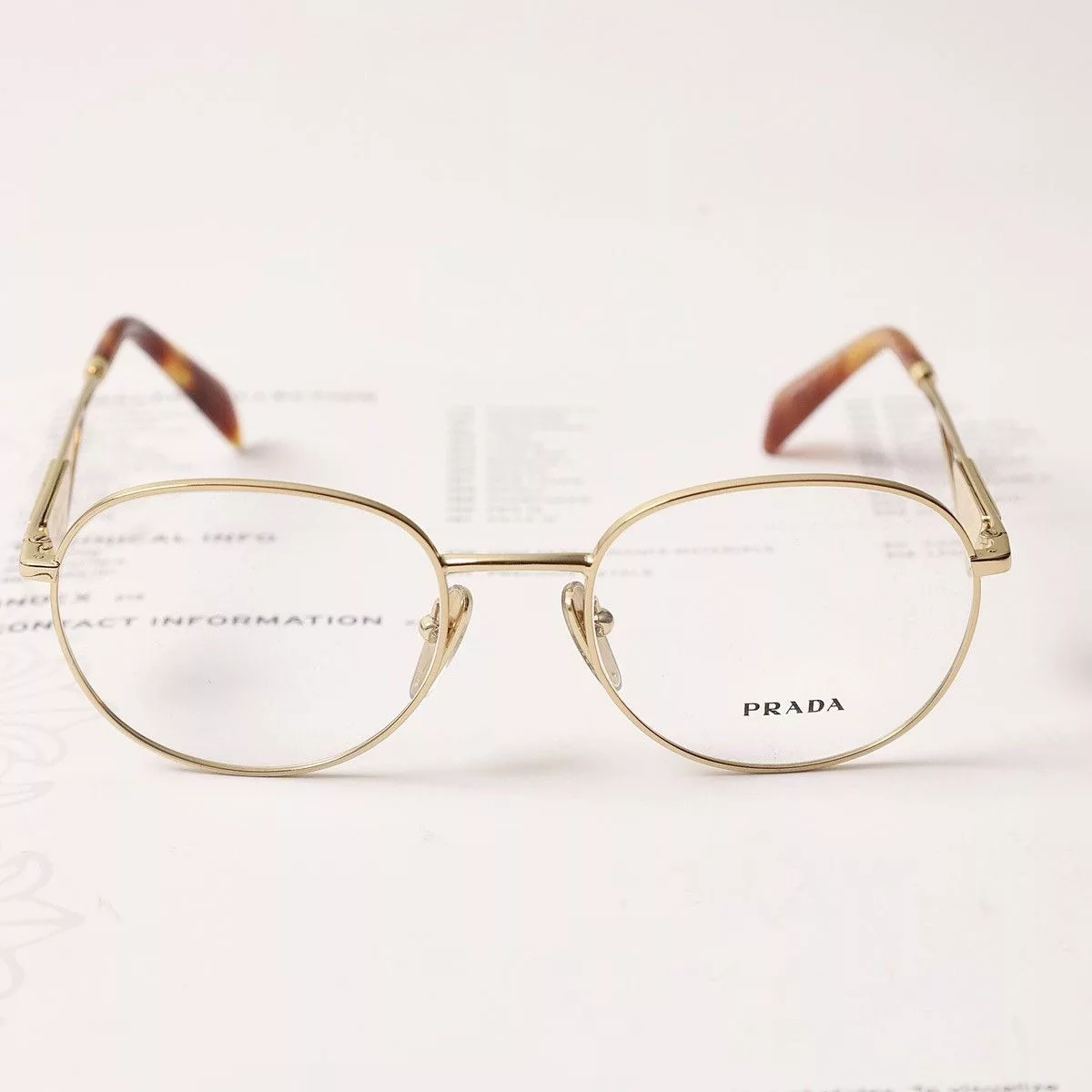 Prada Glasses PRADA 0PR A50V GLASSES Gold