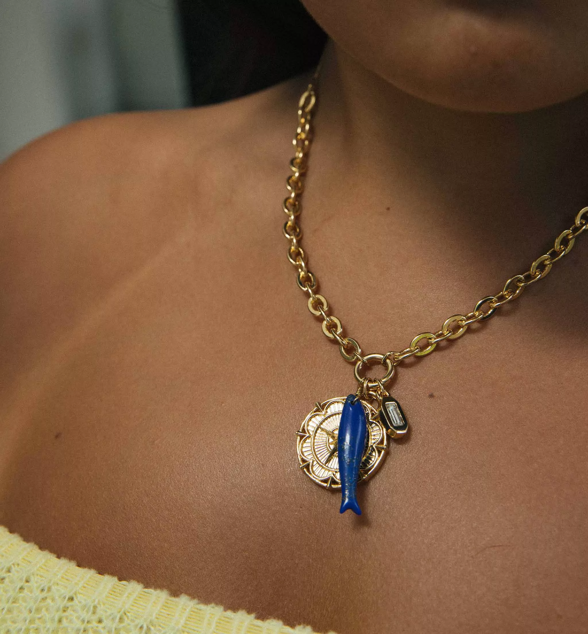 The Gemstone Fish Charm