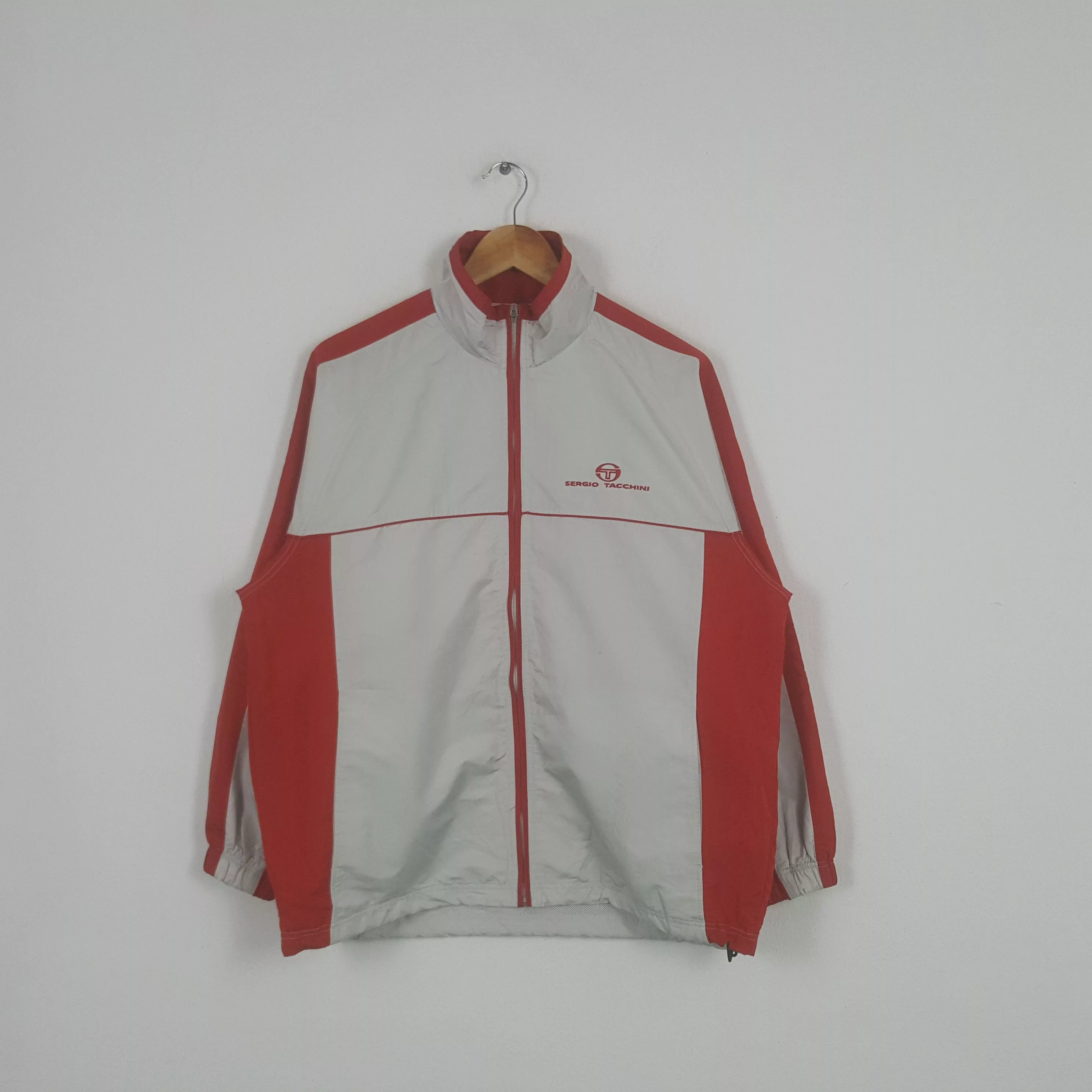 Sergio Tacchini Light Jackets Sergio Tacchini × Vintage Vintage Sergio Tacchini Sports Style Windbreaker Jacket Silver