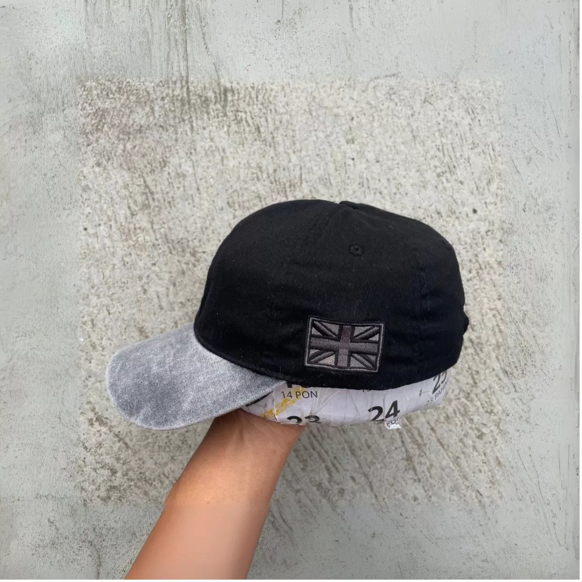 Unsound Rags Hats Unsound Rags Sick washed brim hat with black england flag Multi Avant-Garde