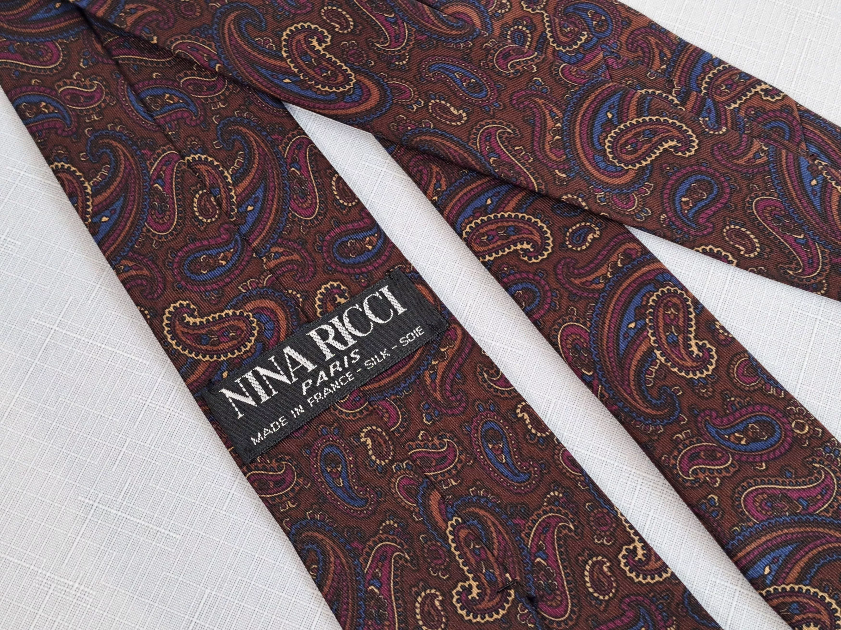 Designer Ties Pocketsquares Designer NINA RICCI paisley pattern silk tie. Made in France Brown