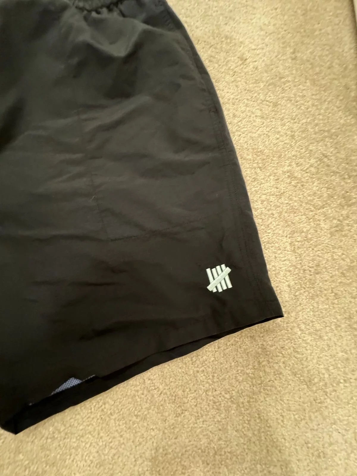 Undefeated Shorts UNDEFEATED Black Nylon Shorts inside bball mesh