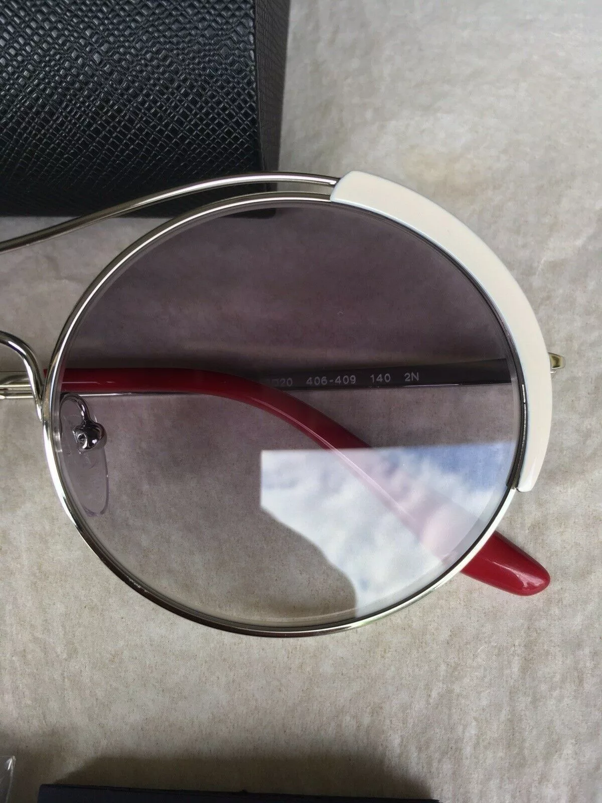 Prada Sunglasses PRADA Round Sunglasses SPR 55V Gray