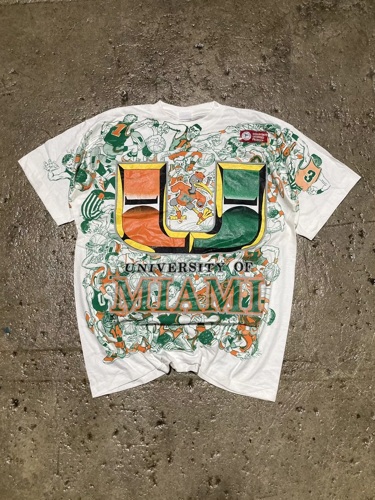 NCAA Short Sleeve T Shirts NCAA × Vintage Crazy Vintage 90s Miami Hurricanes AOP Cartoon Tee NFL NBA Multi Streetwear