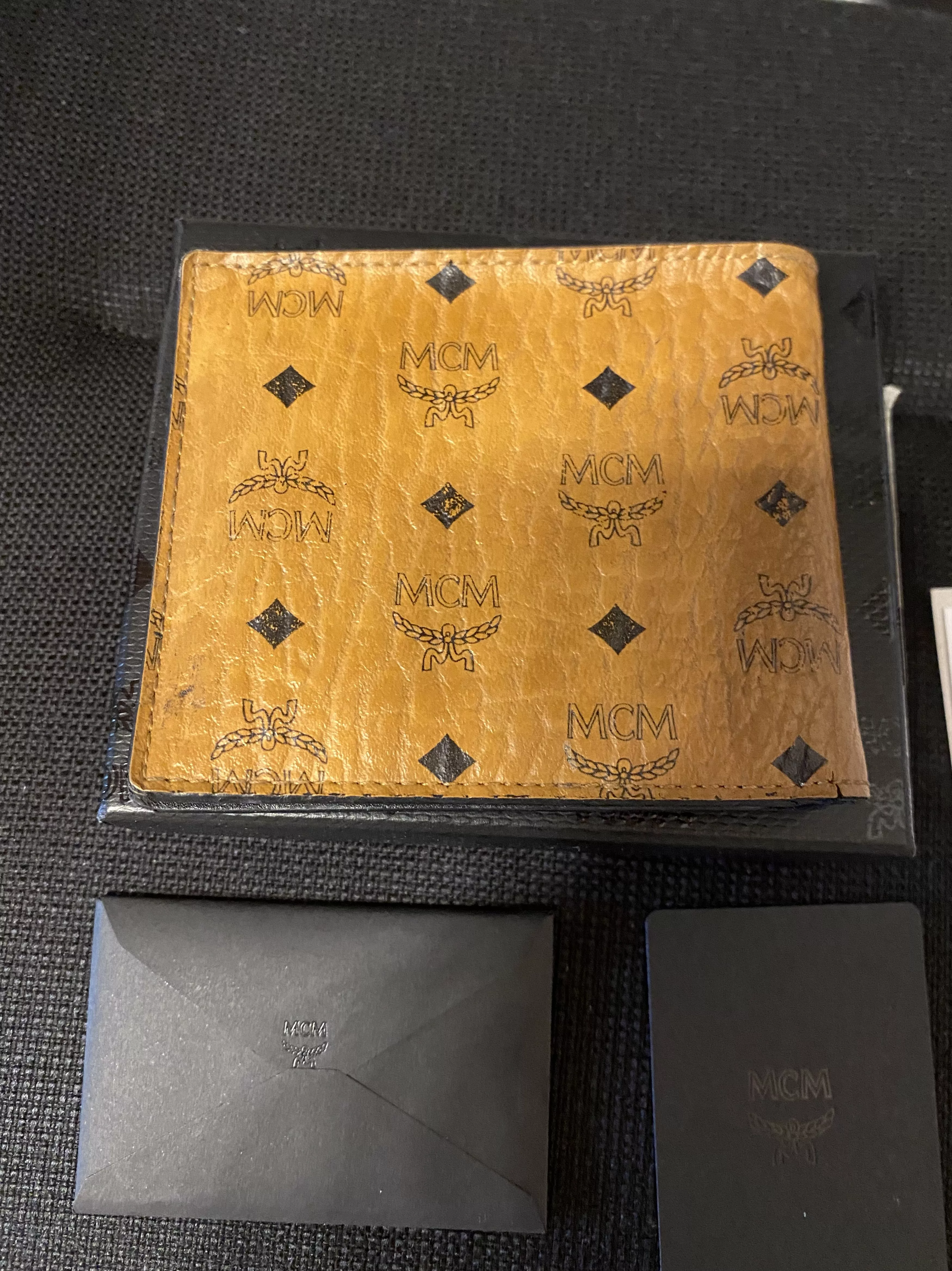 MCM Wallets MCM Wallet Cognac Distressed Victory patch logo print Brown