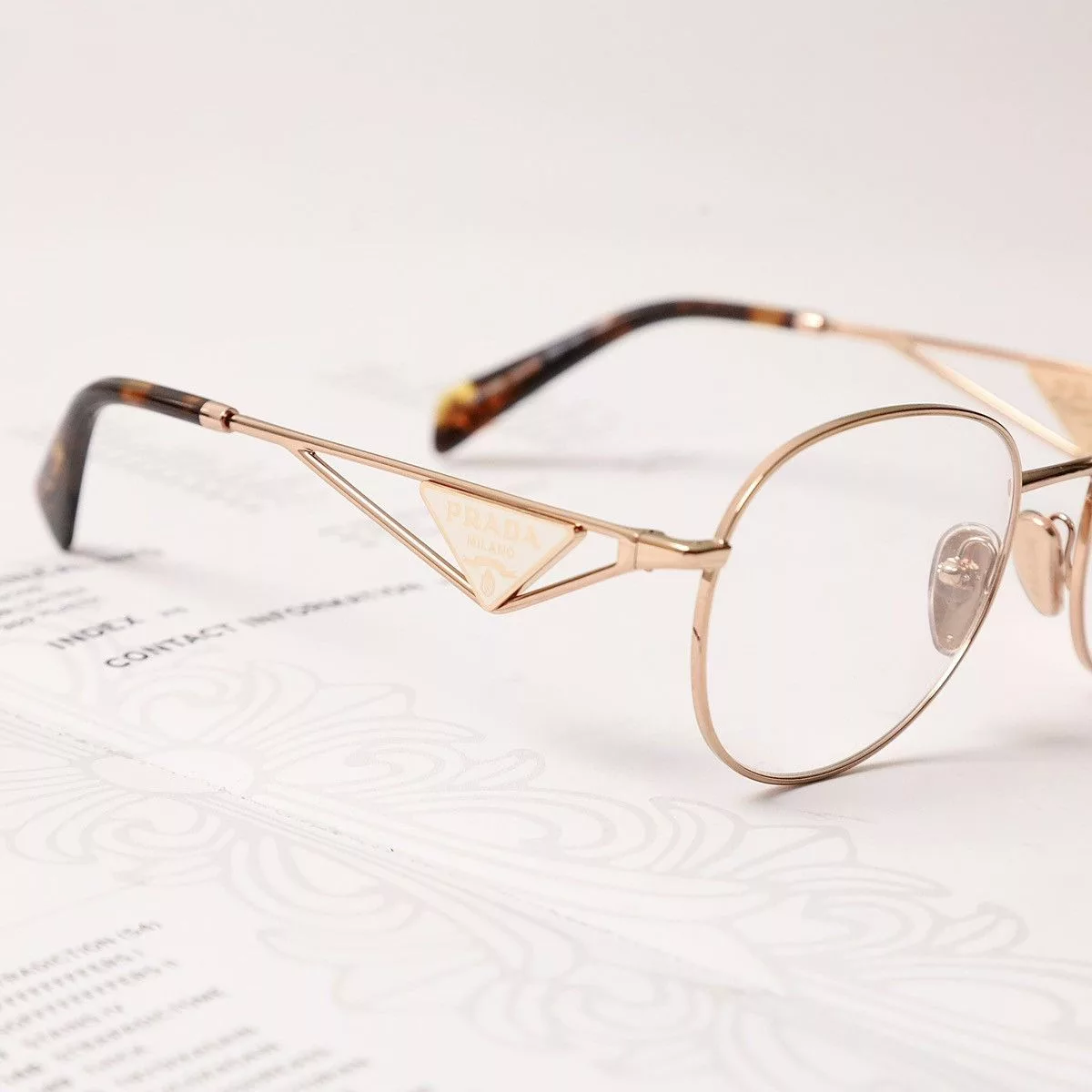 Prada Glasses PRADA 0PR A50V GLASSES Gold
