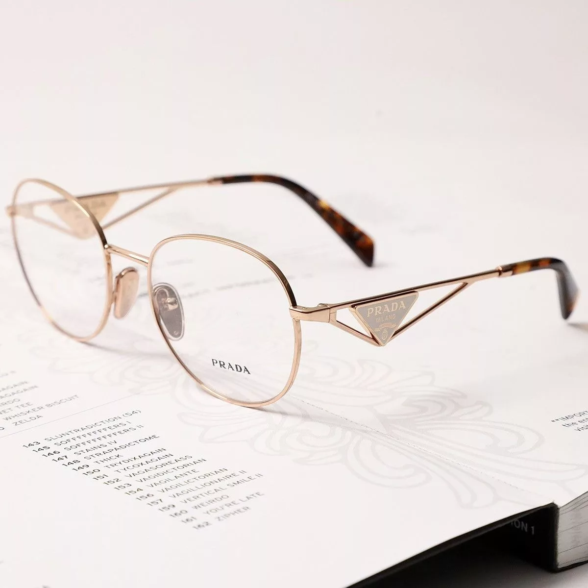 Prada Glasses PRADA 0PR A50V GLASSES Gold