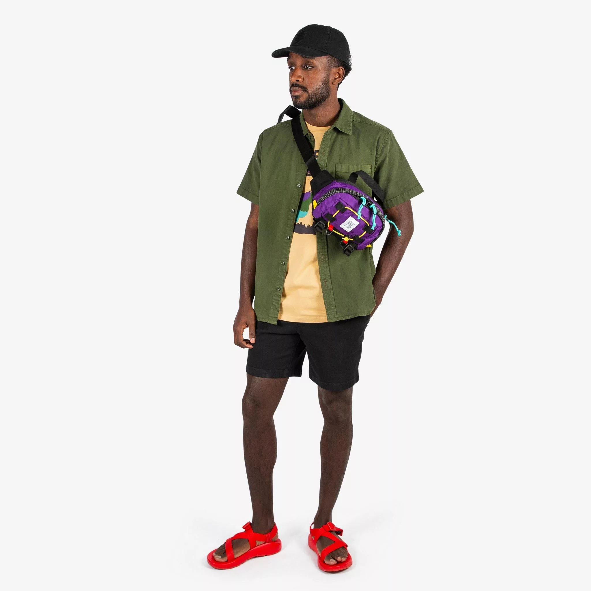 Topo Designs Men's drawstring Dirt Shorts in Black on model.