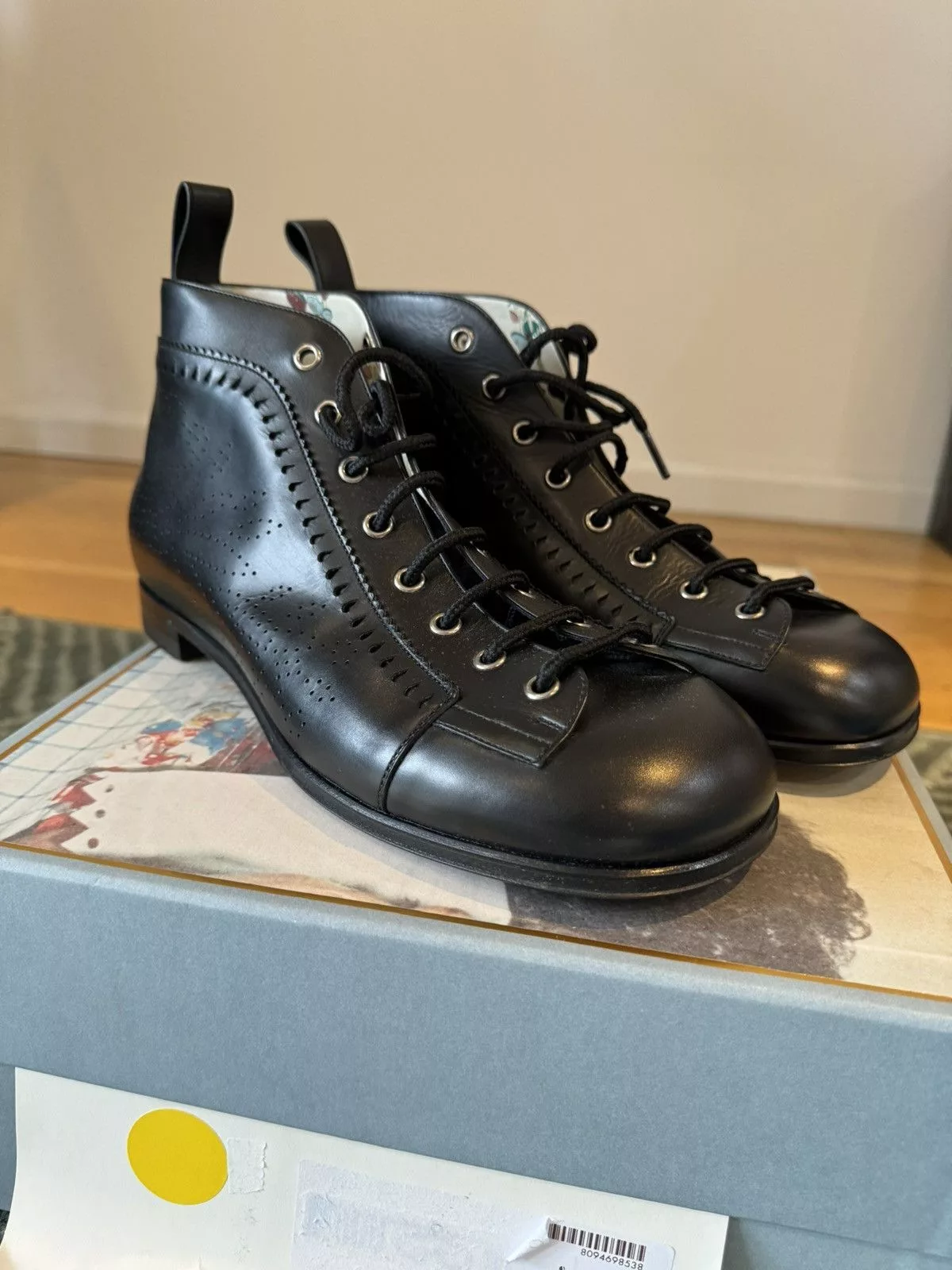 Gucci Boots GUCCI PERFORATED LEATHER JAKARTA BOOTS Black