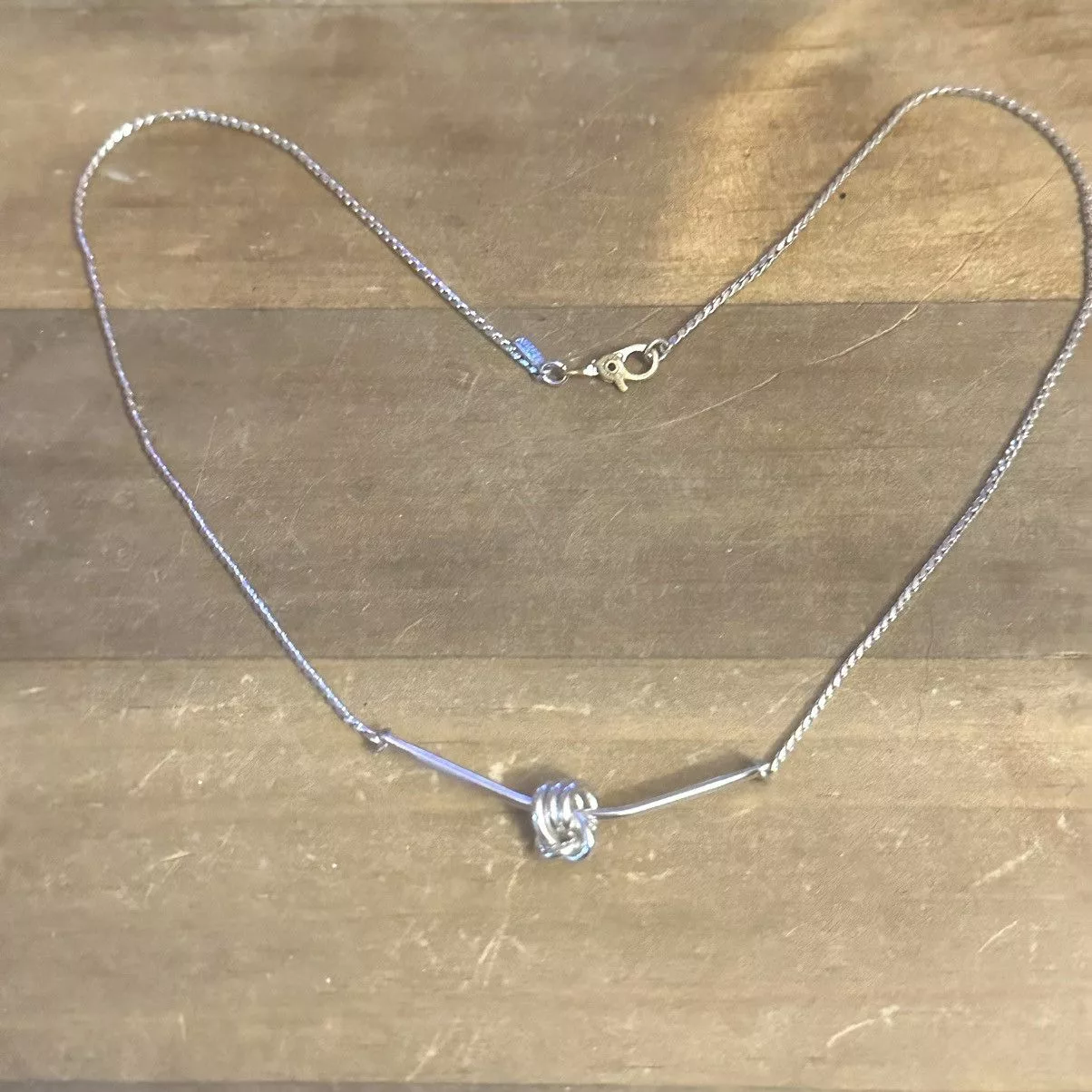 Monet Necklaces Vintage Monet love knot necklace Silver