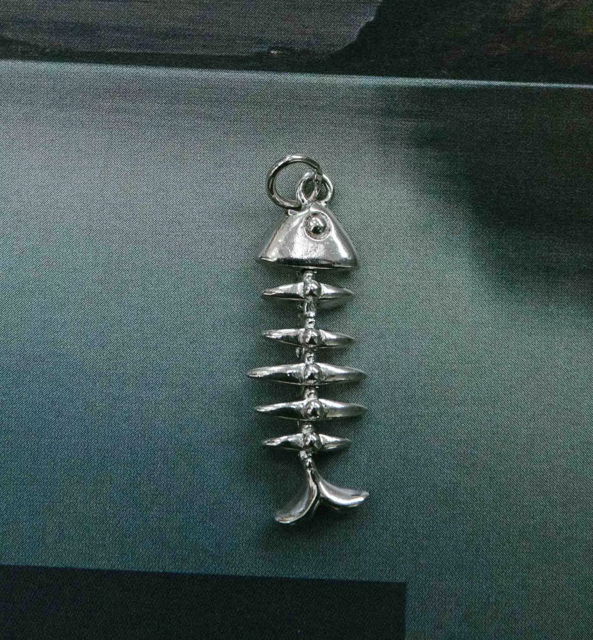 The Skeleton Fish Charm
