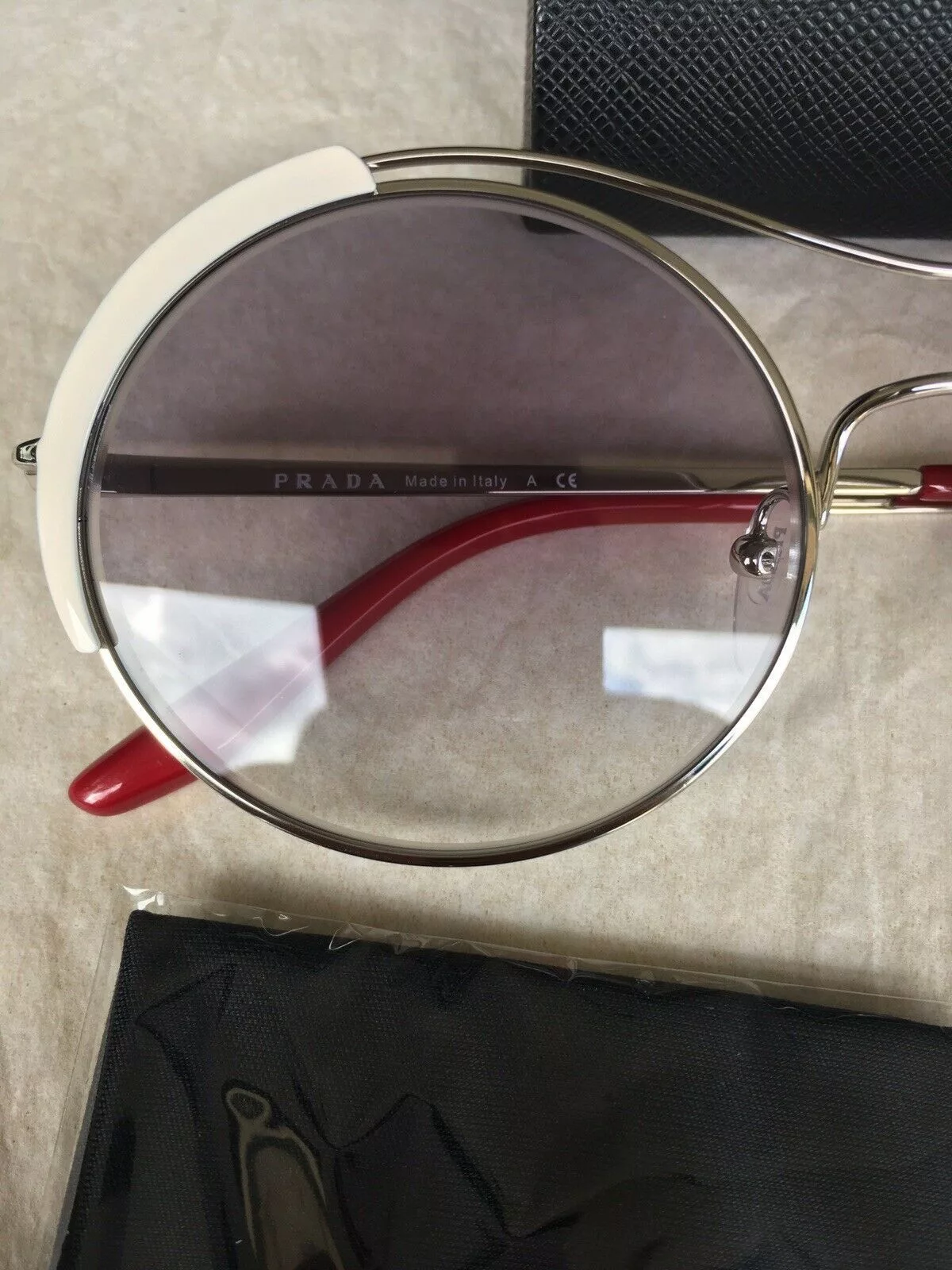 Prada Sunglasses PRADA Round Sunglasses SPR 55V Gray