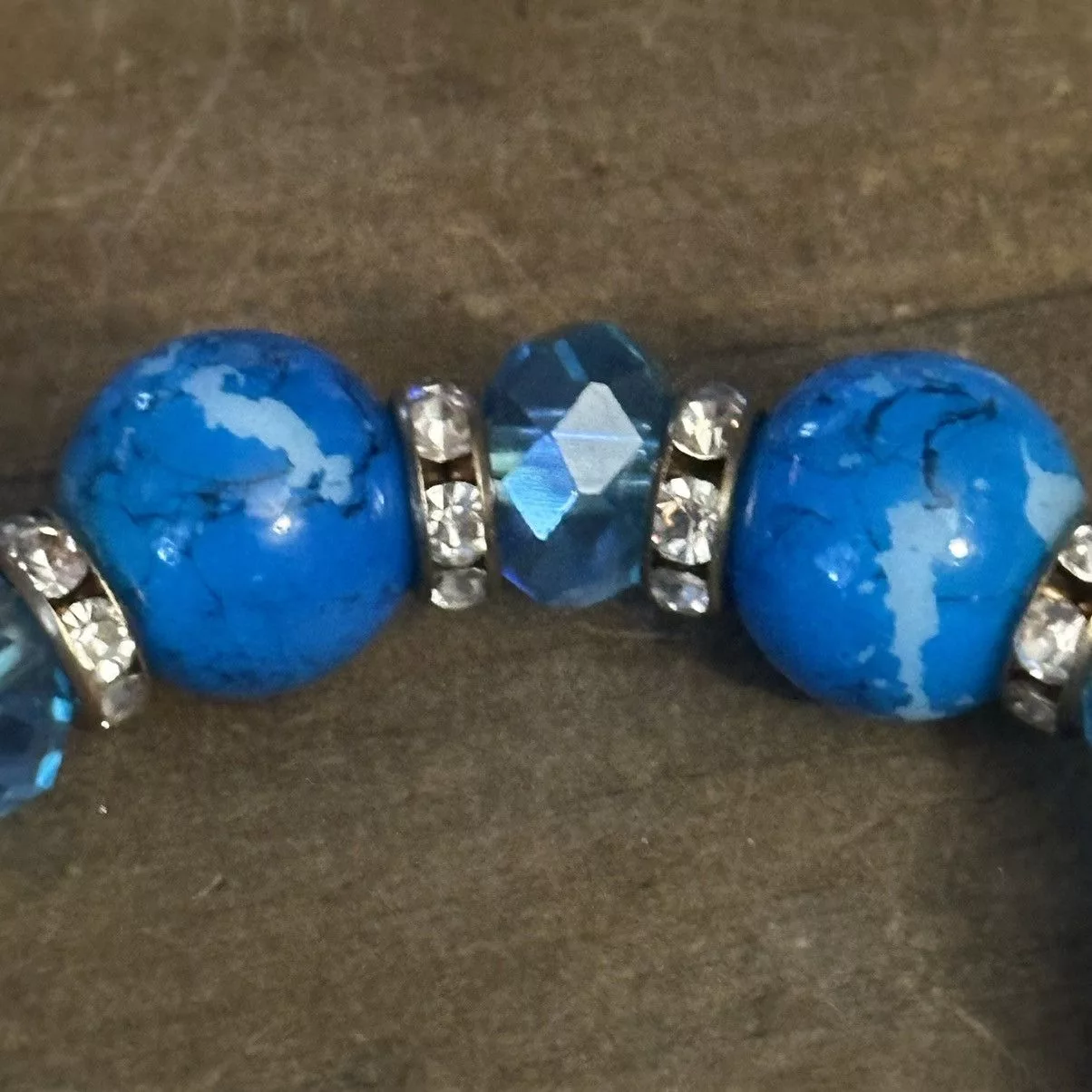 Other Bracelets Other Blue beaded stretch bracelet with cross charm