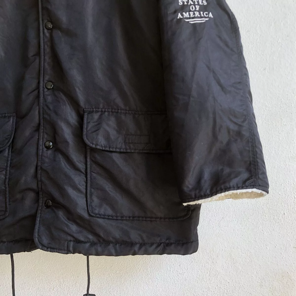 Converse Raincoats CONVERSE spellout embroidered logo raincoat Black