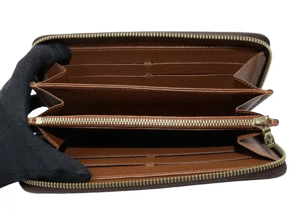 Louis Vuitton Wallets Louis Vuitton Zippy Monogram Leather Brown Wallet