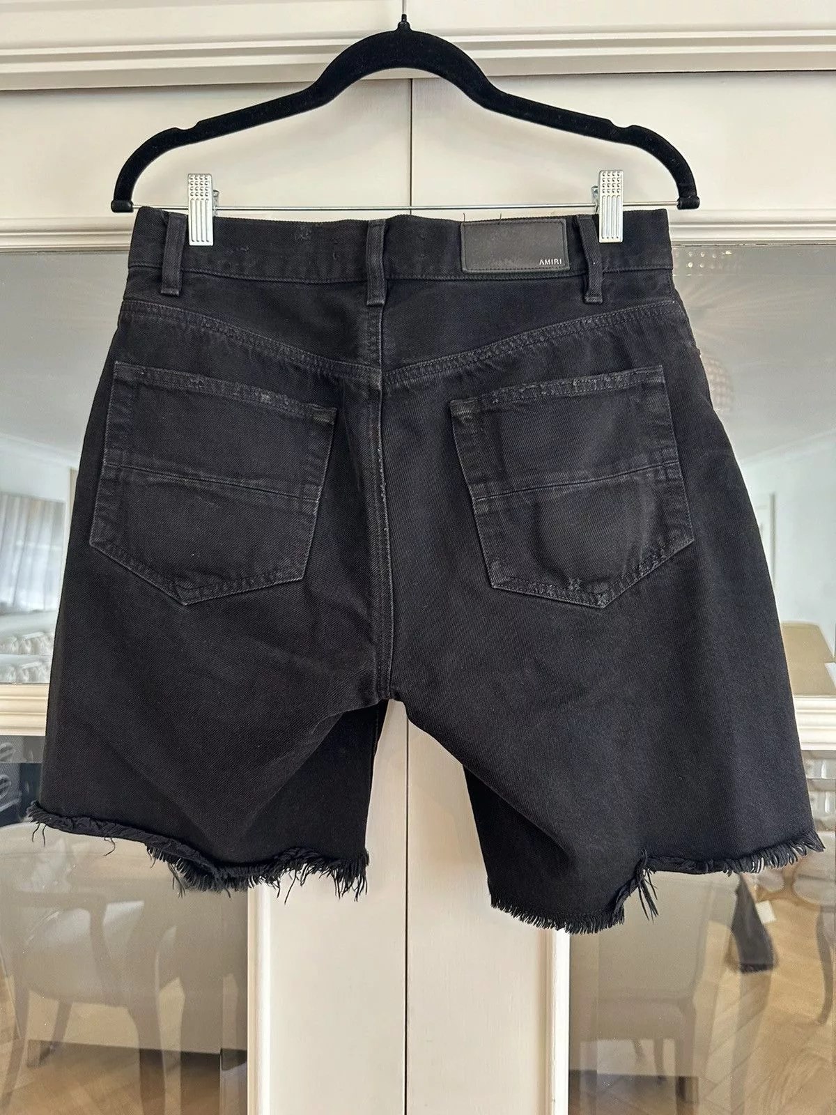 Amiri Shorts Amiri Black distressed denim shorts