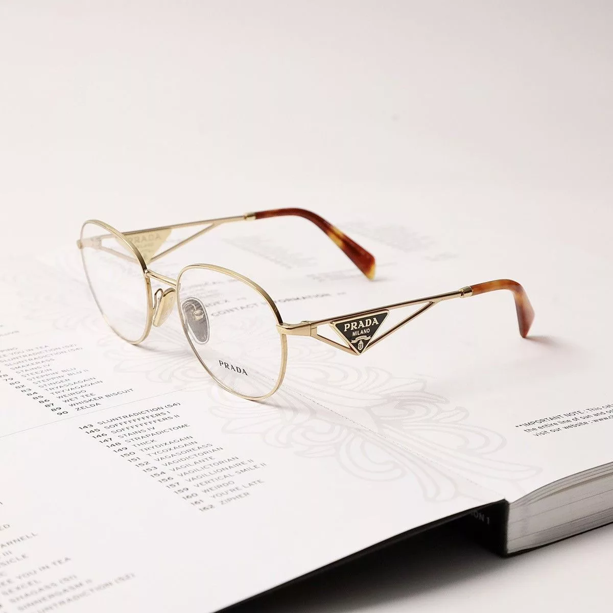 Prada Glasses PRADA 0PR A50V GLASSES Gold