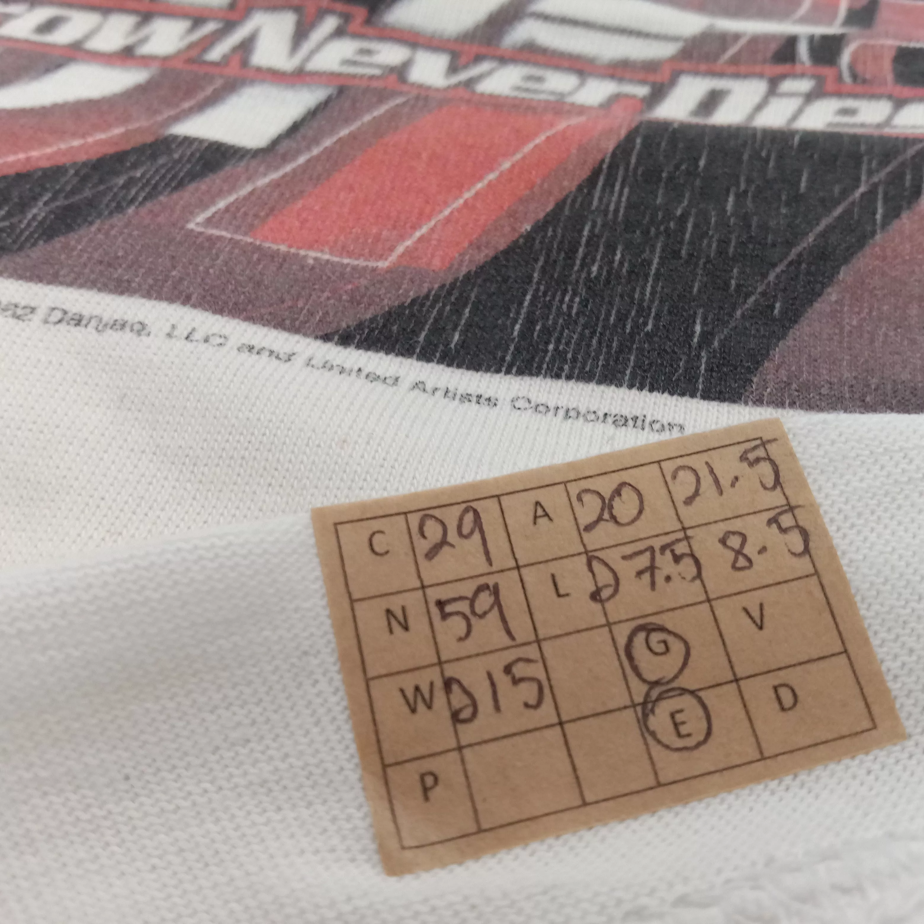 Universal Studios Short Sleeve T Shirts Universal Studios × Vintage James Bond 007 Tomorrow Never Dies Movie Tshirt White