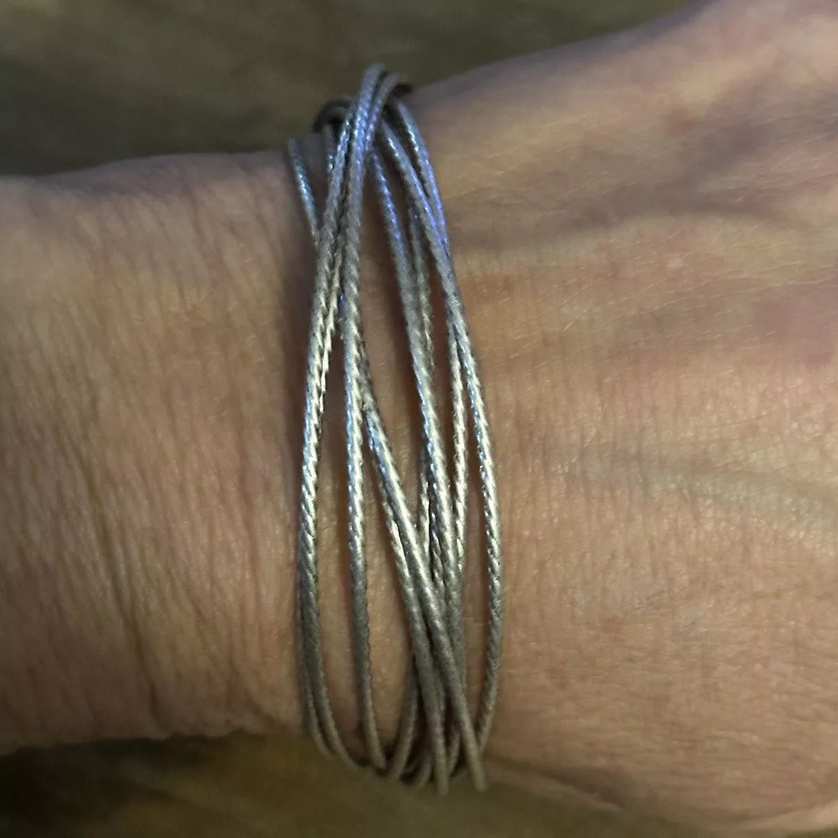 Other Bracelets Other Silver tone textured interlocking bangle bracelet