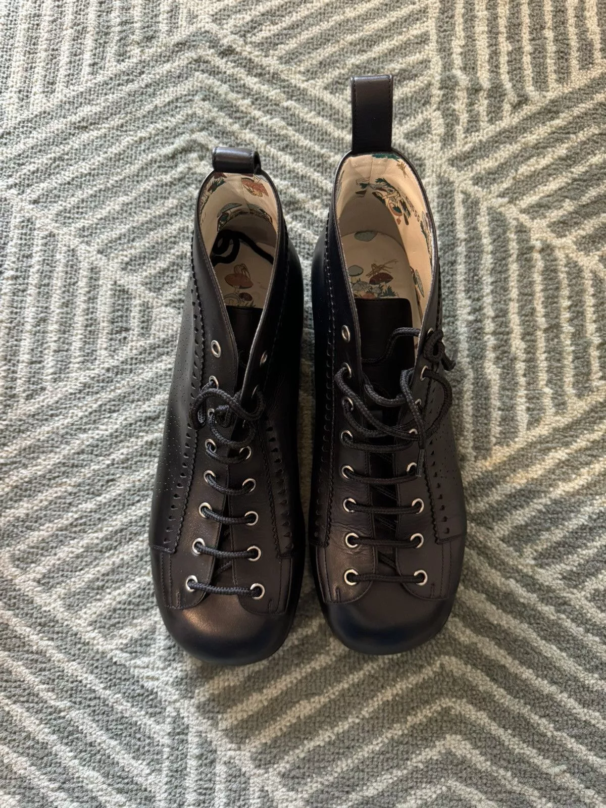 Gucci Boots GUCCI PERFORATED LEATHER JAKARTA BOOTS Black