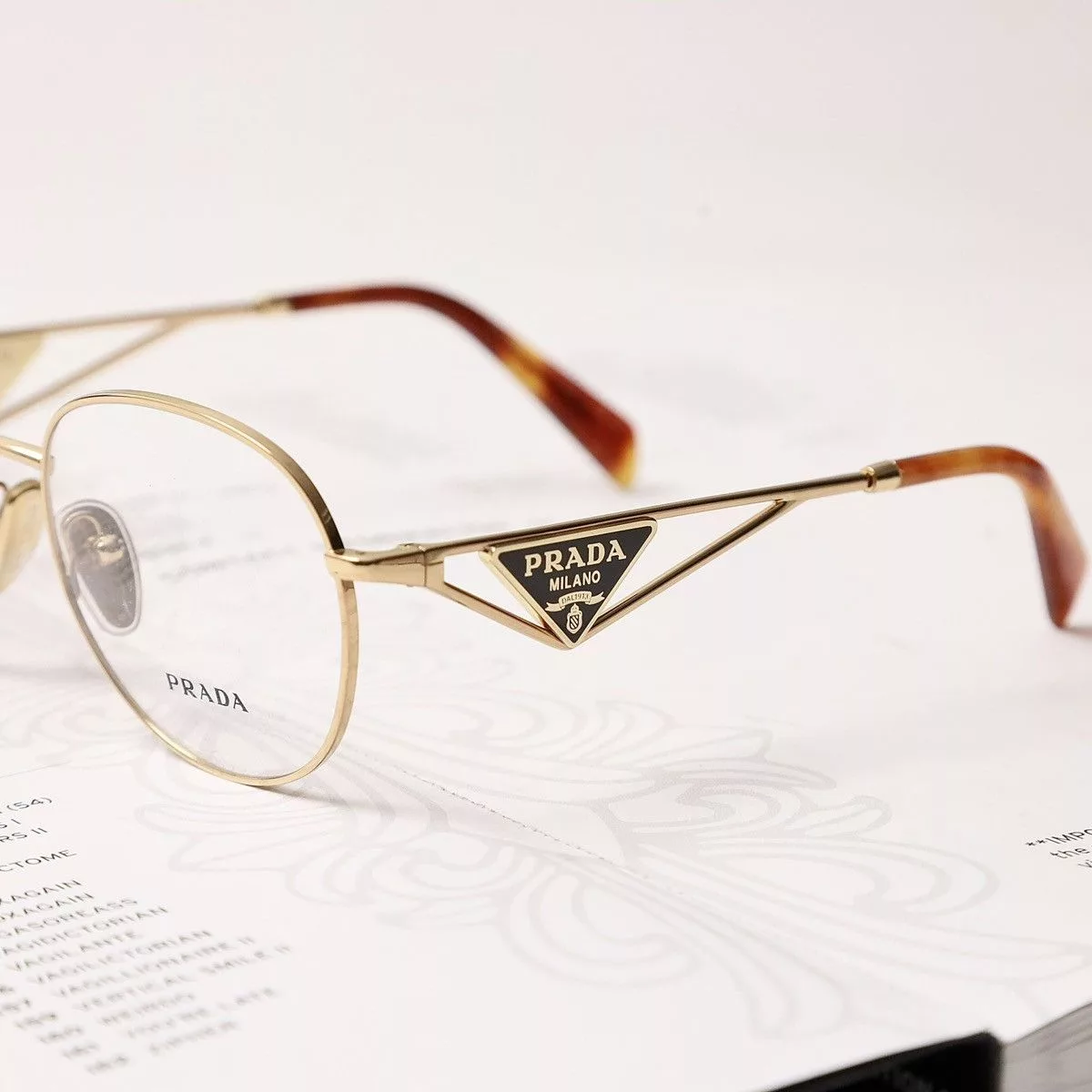 Prada Glasses PRADA 0PR A50V GLASSES Gold