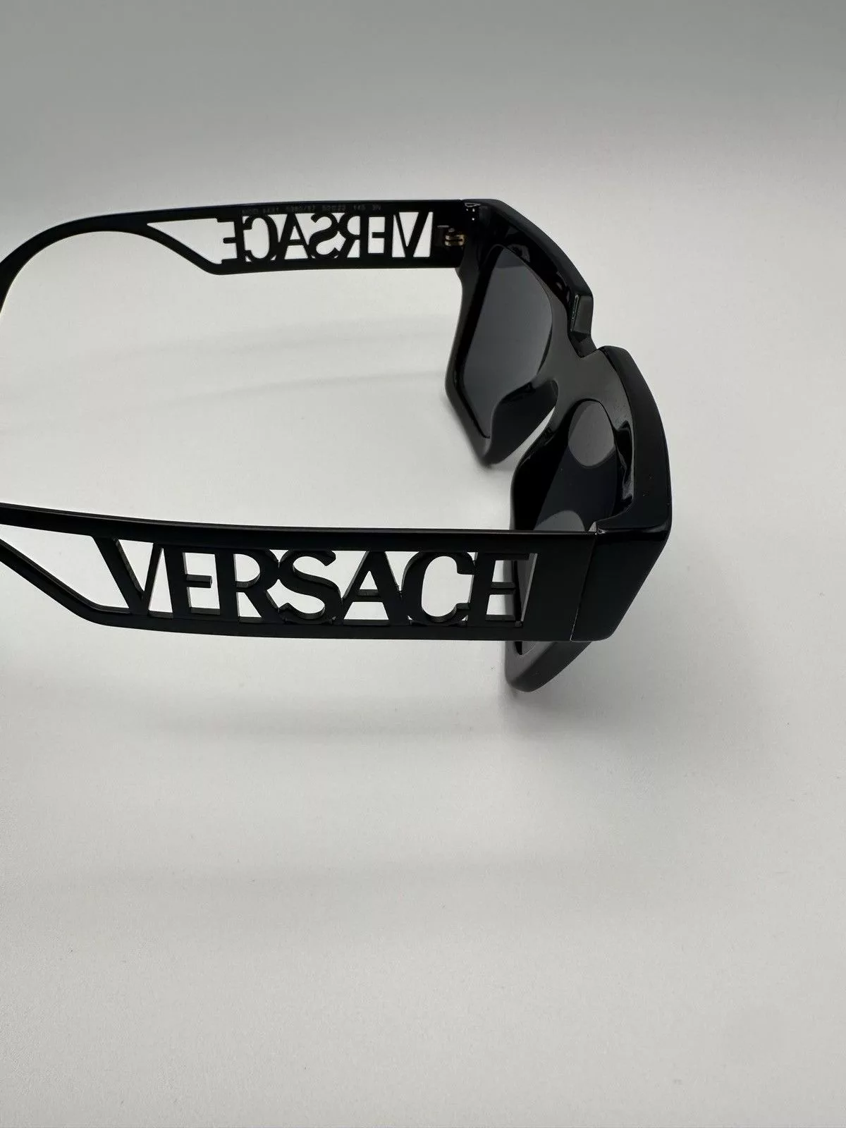 Versace Sunglasses Versace Spell-out Sunglasses Black