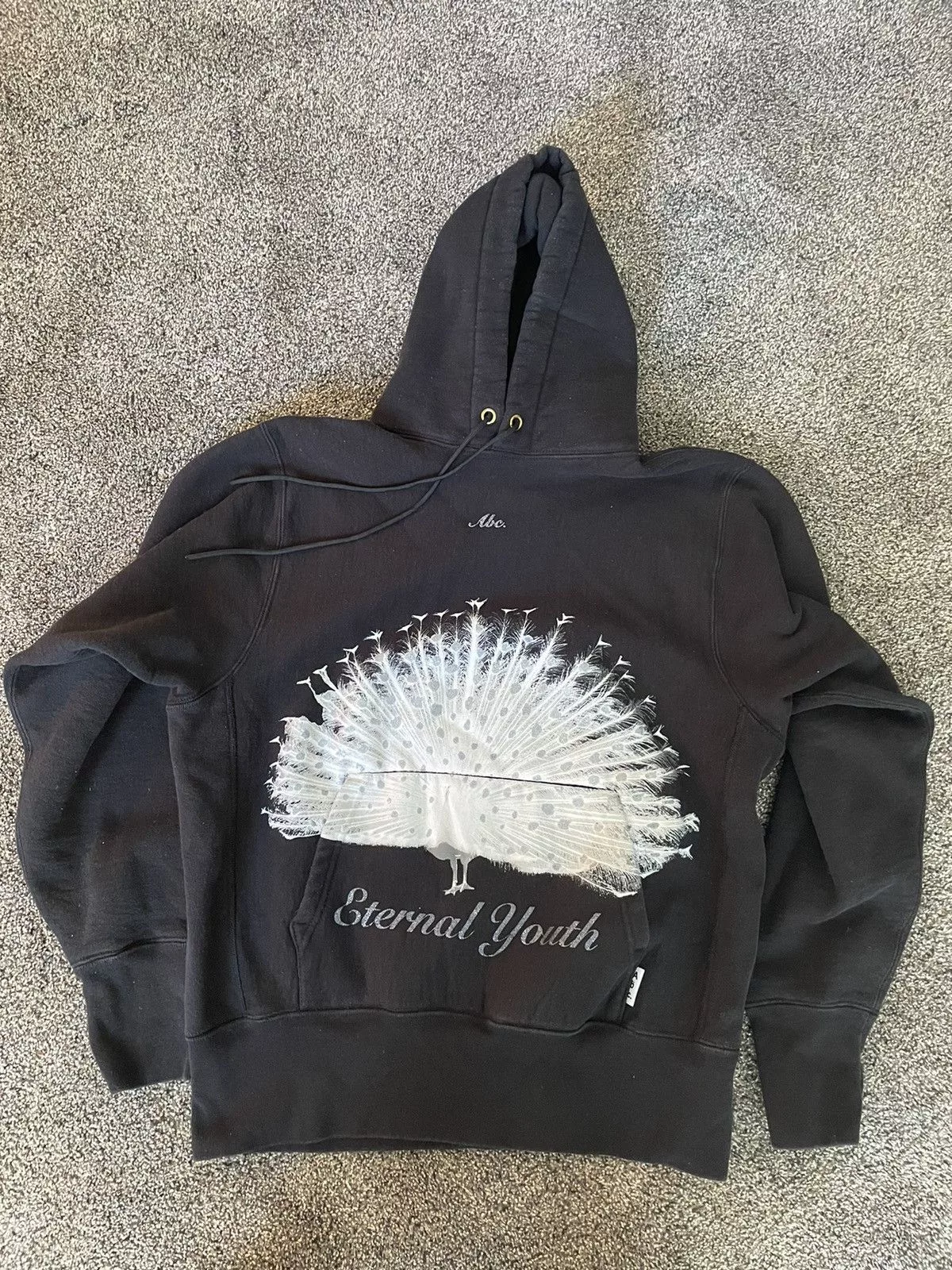 Advisory Board Crystals Sweatshirts Hoodies Advisory Board Crystals × Story Mfg. Rare Advisory Board Crystals Peacock eternal youth hoodie Black